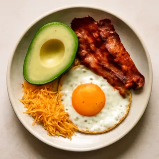 Avocado, Bacon And Egg Breakfast Bowls With Sharp Cheddar